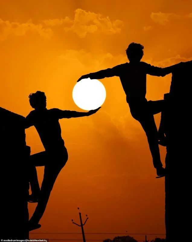 摄影师拍摄的借位照片把太阳玩起来